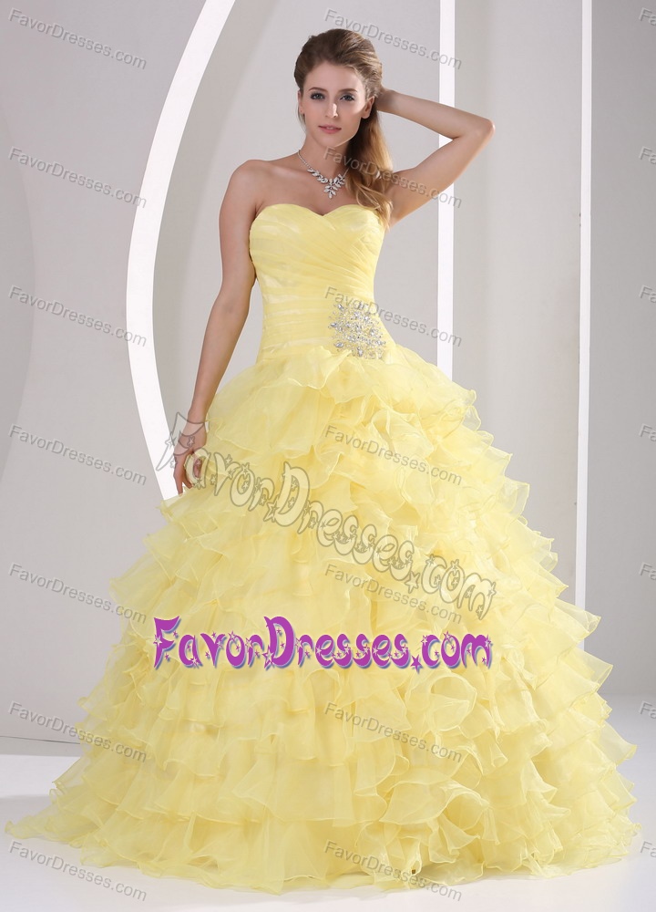 Light Yellow Appliqued and Ruched Quinceaneras Dresses with Ruffles