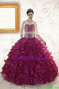Unique Burgundy Quinceanera Gown with Beading and Ruffles